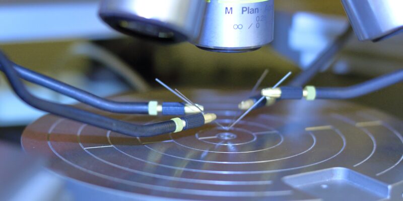 a close up of a machine with some wires on it