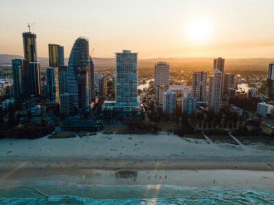 An aerial view of a city at sunset