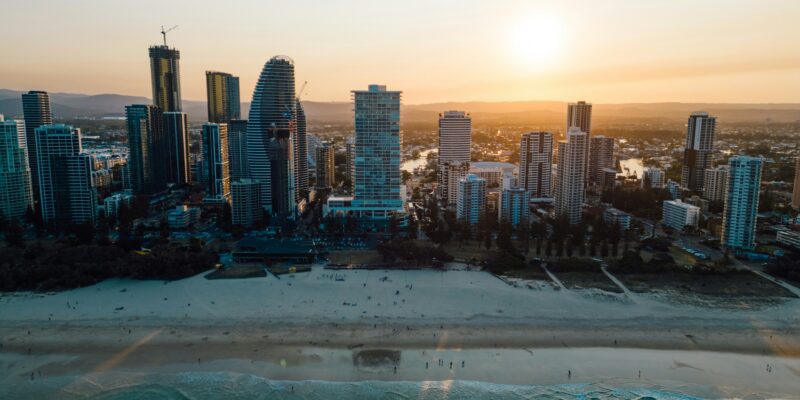 An aerial view of a city at sunset